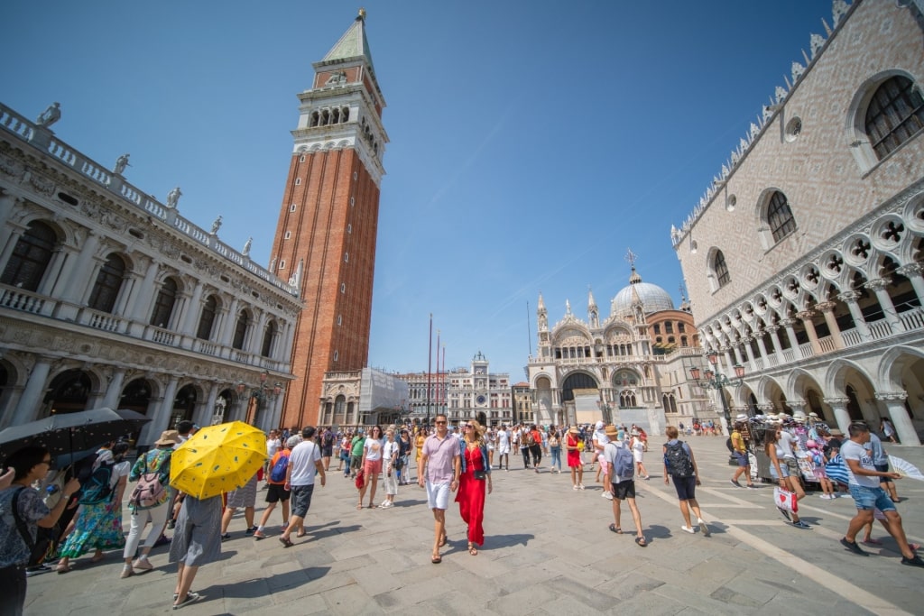 People strolling St. Mark’s Square, Venice