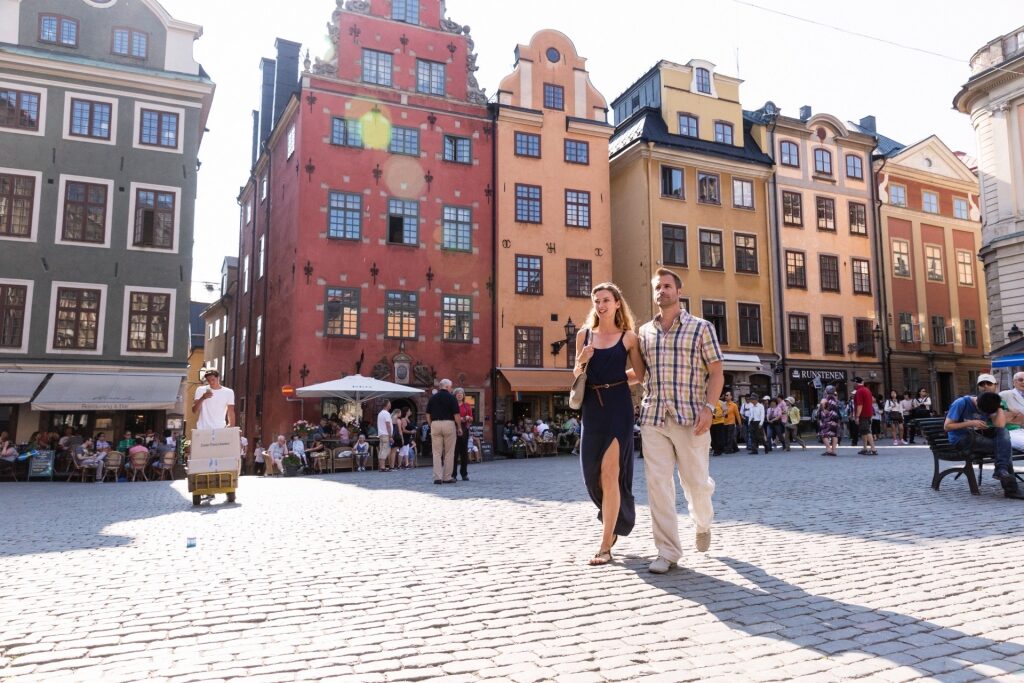 Couple exploring Gamla Stan in Stockholm, Sweden