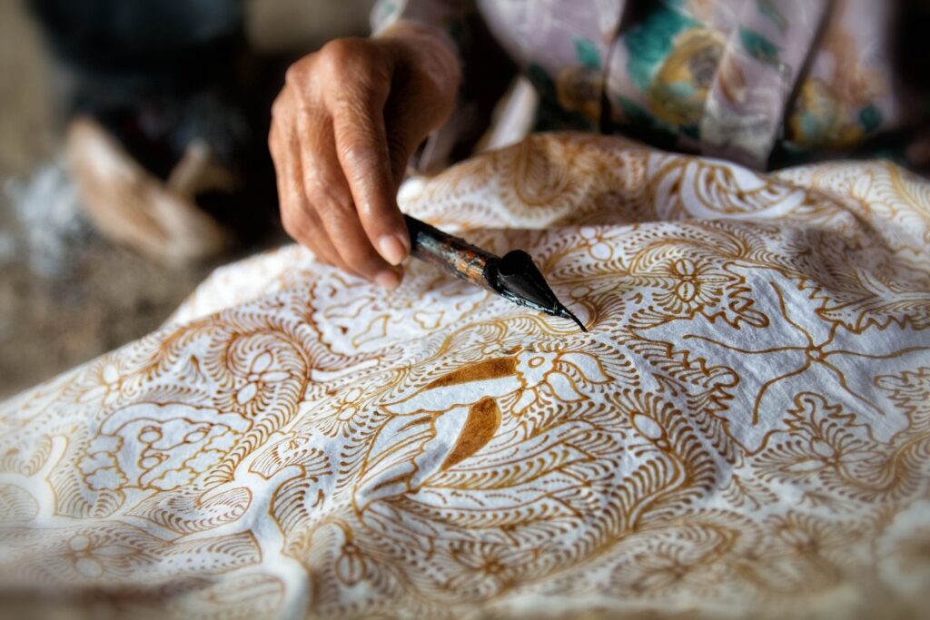 Person designing batik in Langkawi