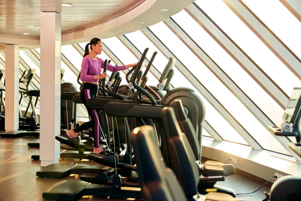 Woman working inside Fitness Center on Celebrity Beyond