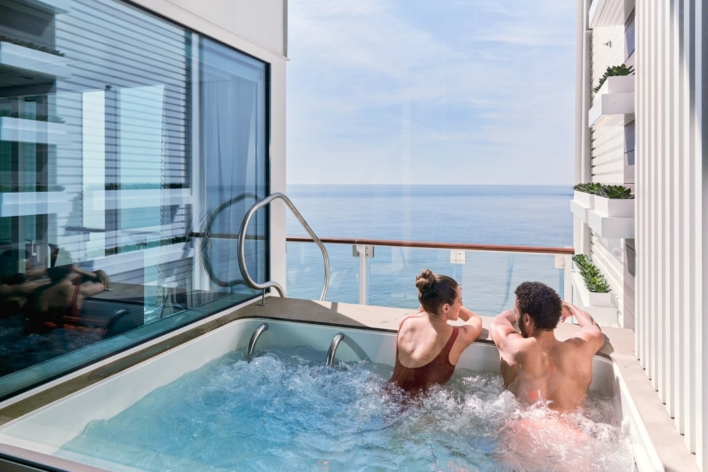 Couple in a jacuzzi on Celebrity Edge Villa