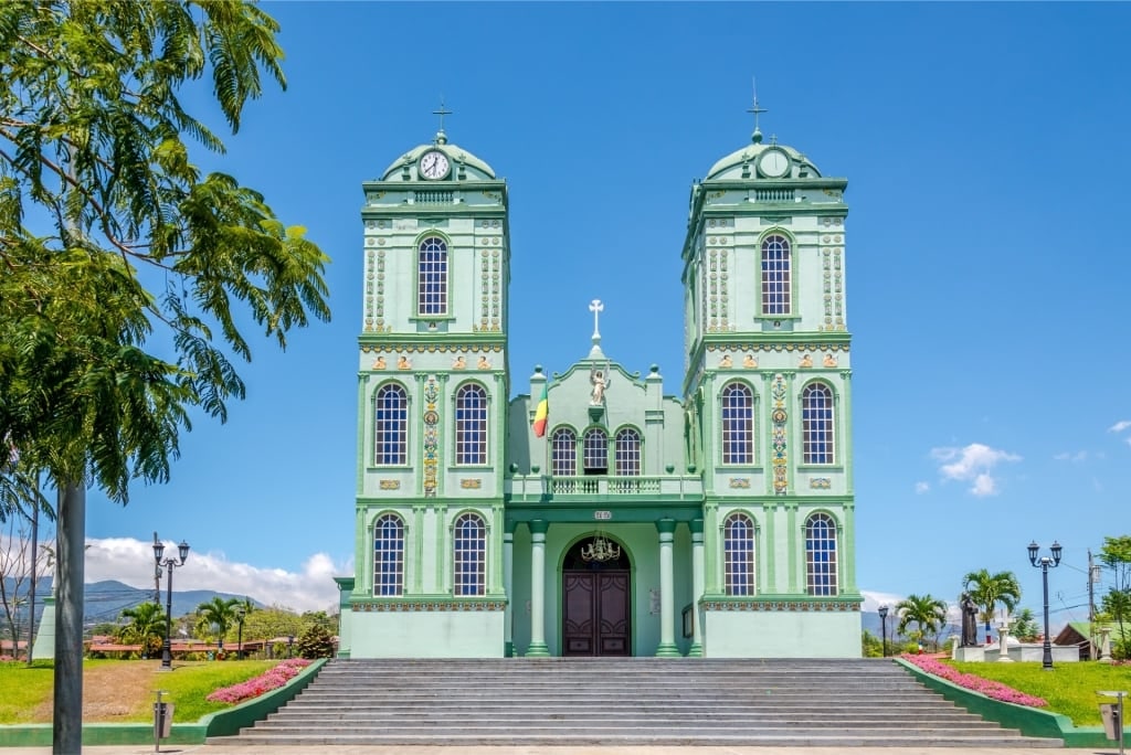 Green facade of a church in Sarchí