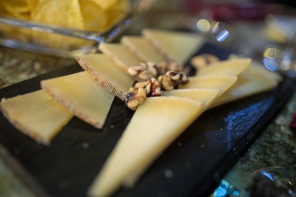 Manchego cheese on a platter