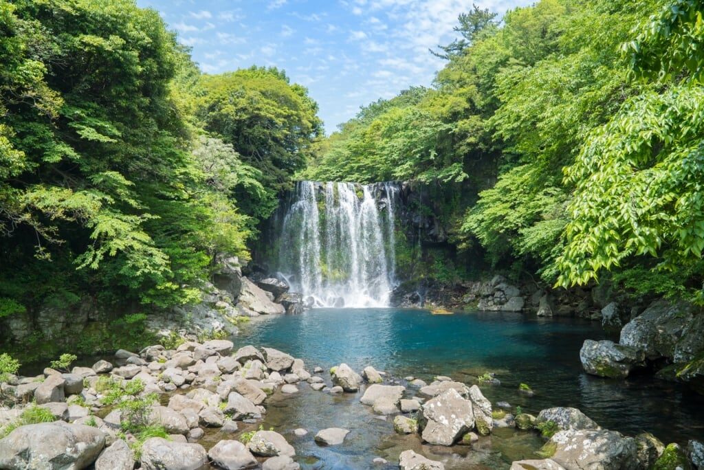 Visit Cheonjeyeon Waterfalls, one of the best things to do in Jeju Island