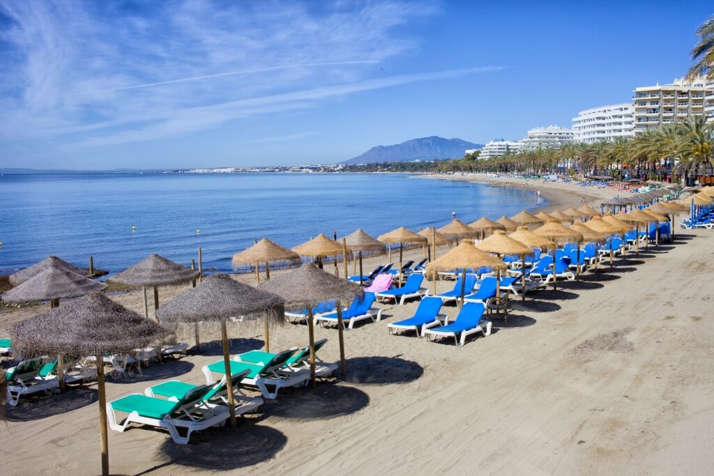 Beach umbrellas along Playa Fontanilla, Marbella