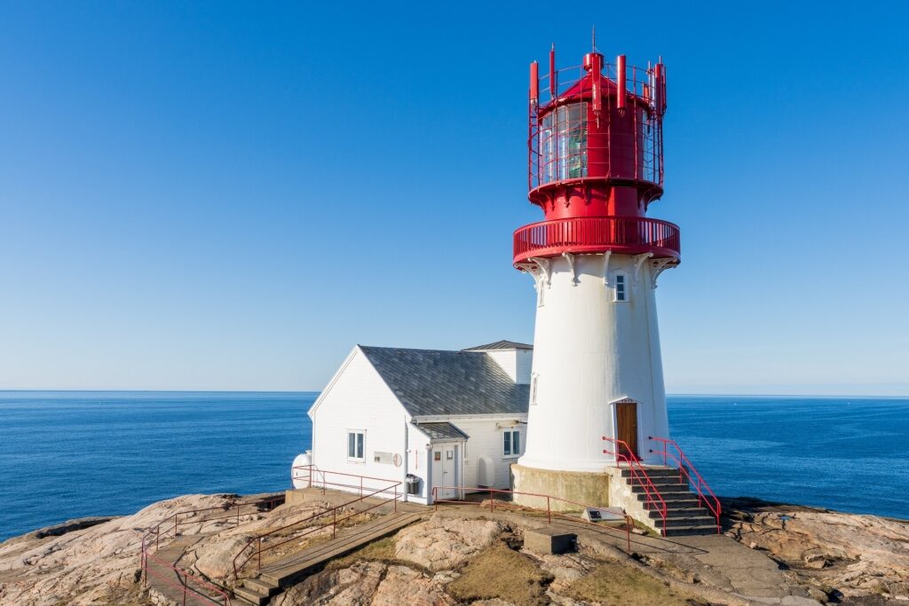Red and white facade of Lindesnes Lighthouse, near Kristiansand, Norway