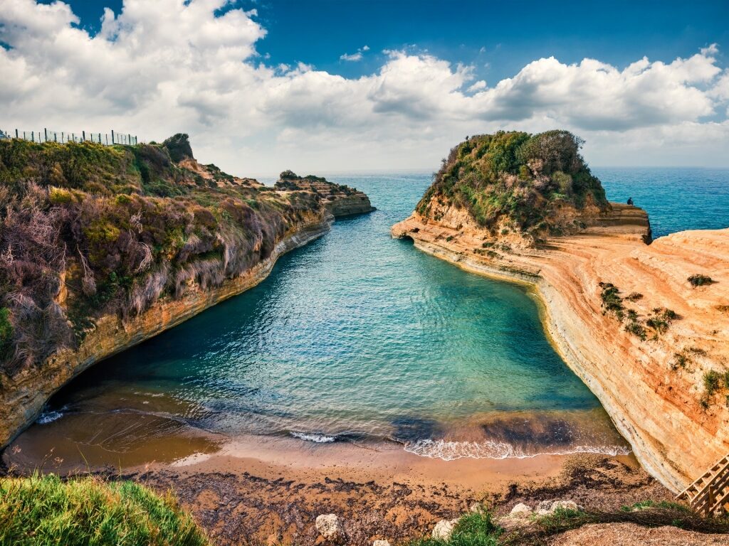 Beautiful beach of Canal d’Amour with rock formations in Corfu, Greece