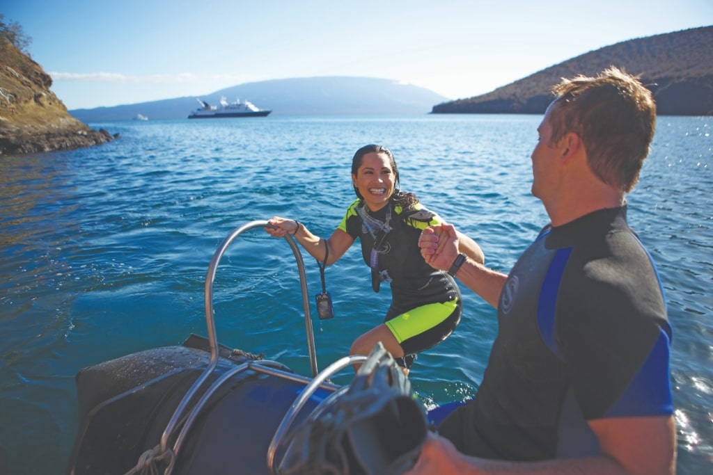 Couple snorkeling in The Galapagos Islands