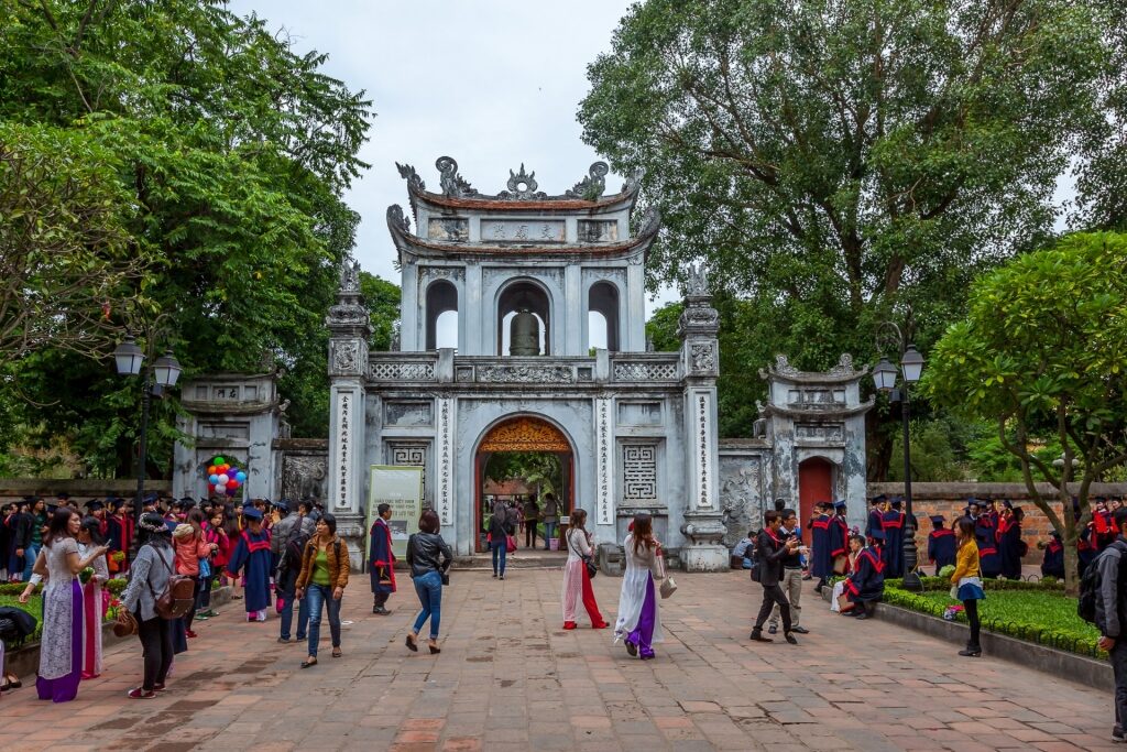 People exploring the Temple of Literature in Hanoi, Vietnam
