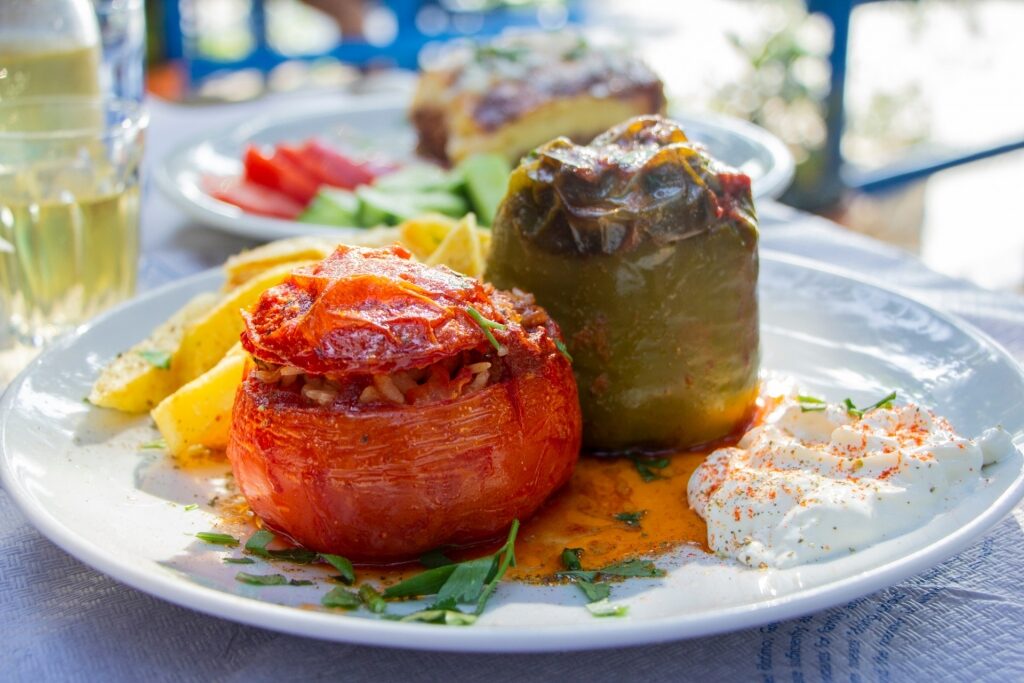 Plate of stuffed tomatoes and bell peppers