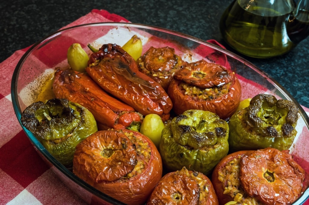 Plate of stuffed tomatoes and bell peppers