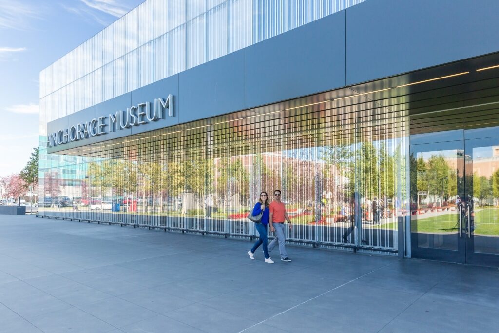 Couple strolling along Anchorage Museum