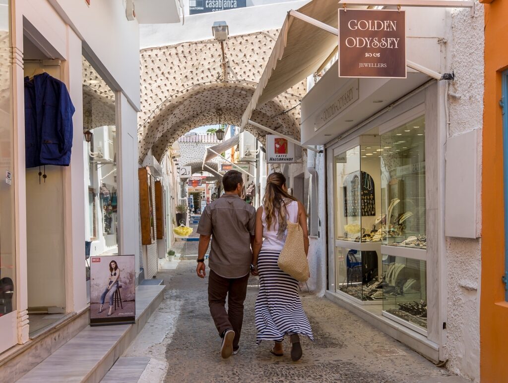 Couple strolling Fira Greece