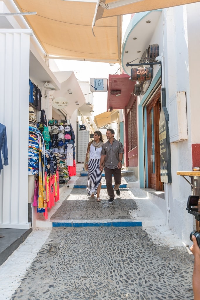 Couple strolling around Fira