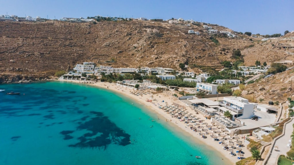 Sandy shoreline of Psarou Beach, Mykonos