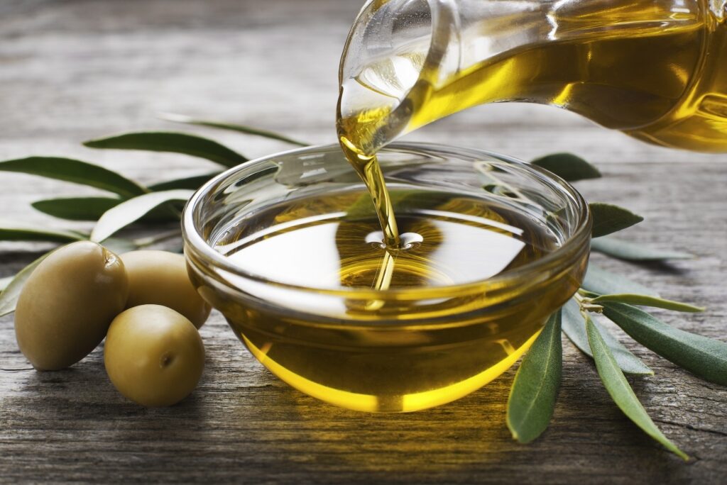 Olive oil poured in a small bowl