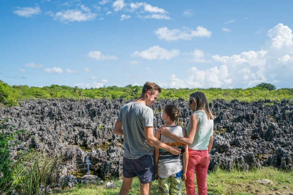 Family looking at the rock formations in Hell, Grand Cayman