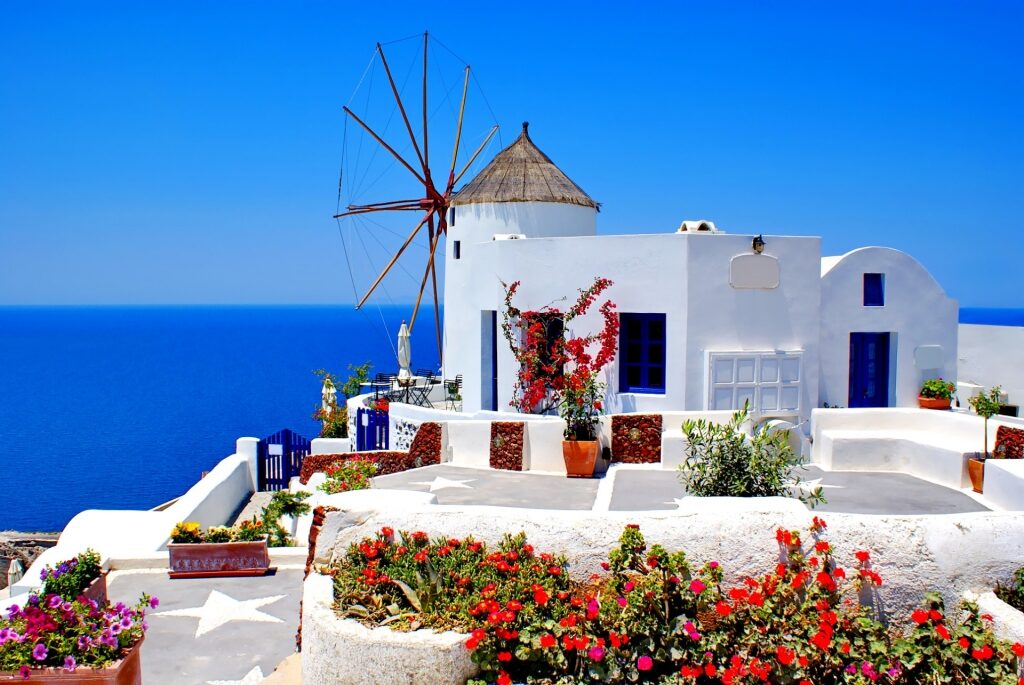 Whitewashed exterior of the windmill of Oia