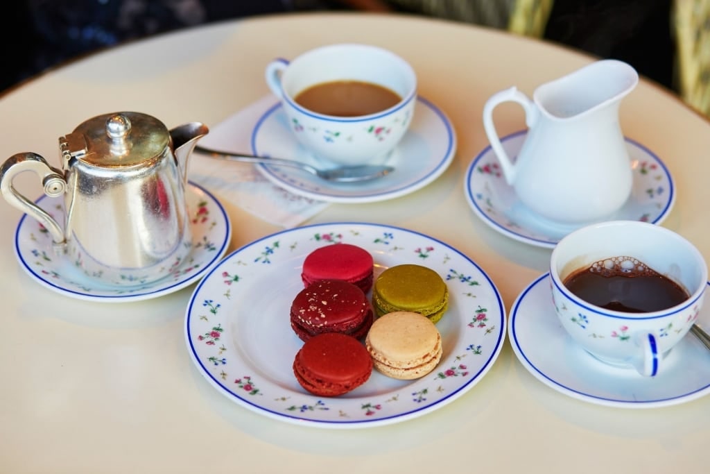 Plate of macarons with tea