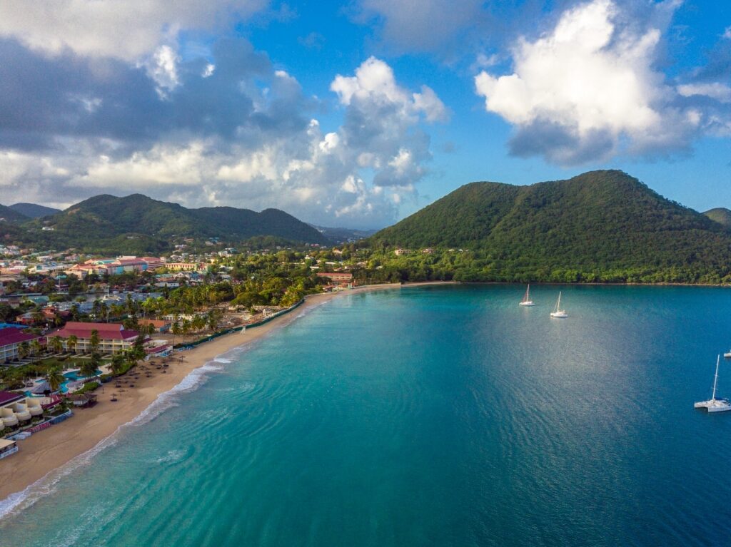 View of Reduit Beach with mountains in St. Lucia 