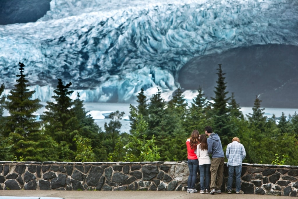 Family sightseeing in front of Mendenhall Glacier
