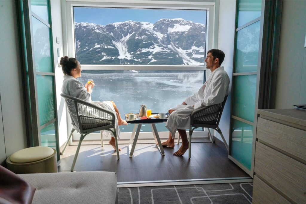 Couple sightseeing from Celebrity's Infinite Veranda