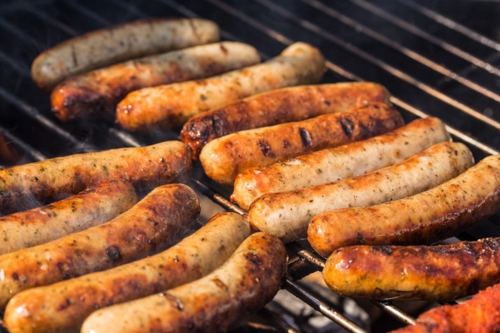 Currywurst on a grill