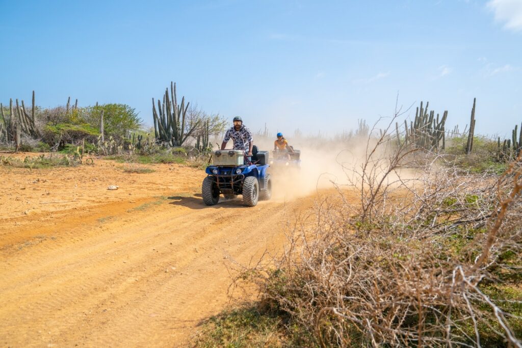 People on an ATV in Aruba