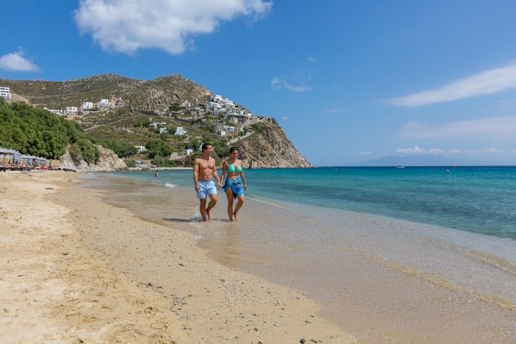 Couple exploring Elia Beach, Mykonos