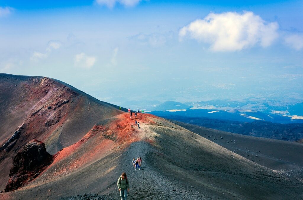 People hiking in Mount Etna, Sicily
