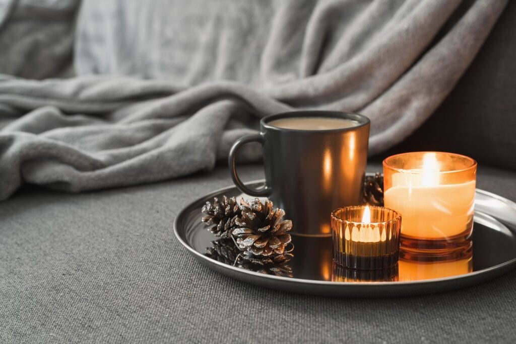Coffee with cozy blanket on a winter day