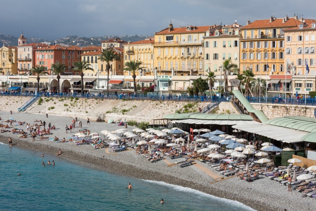 People relaxing on Plage Publique de Castel in Nice, France