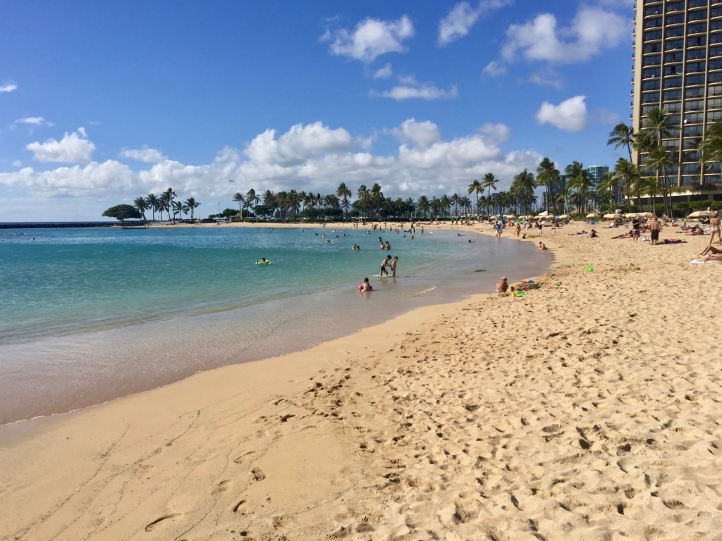 People relaxing on Duke’s Beach