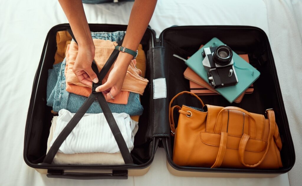 Woman packing luggage