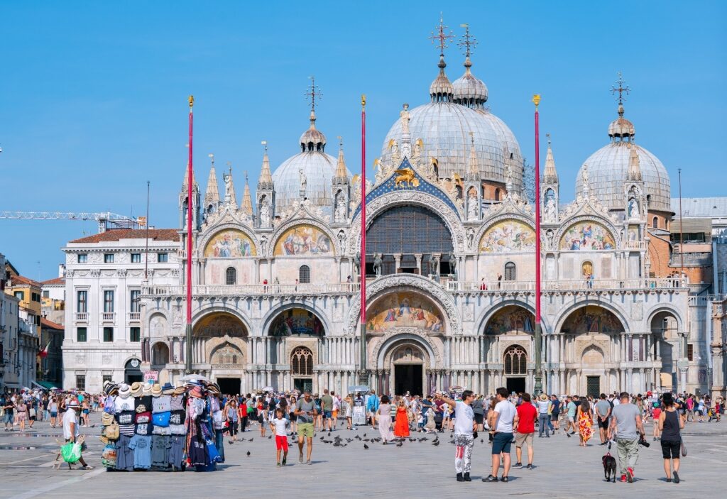 People sightseeing along St. Mark's Basilica, Venice