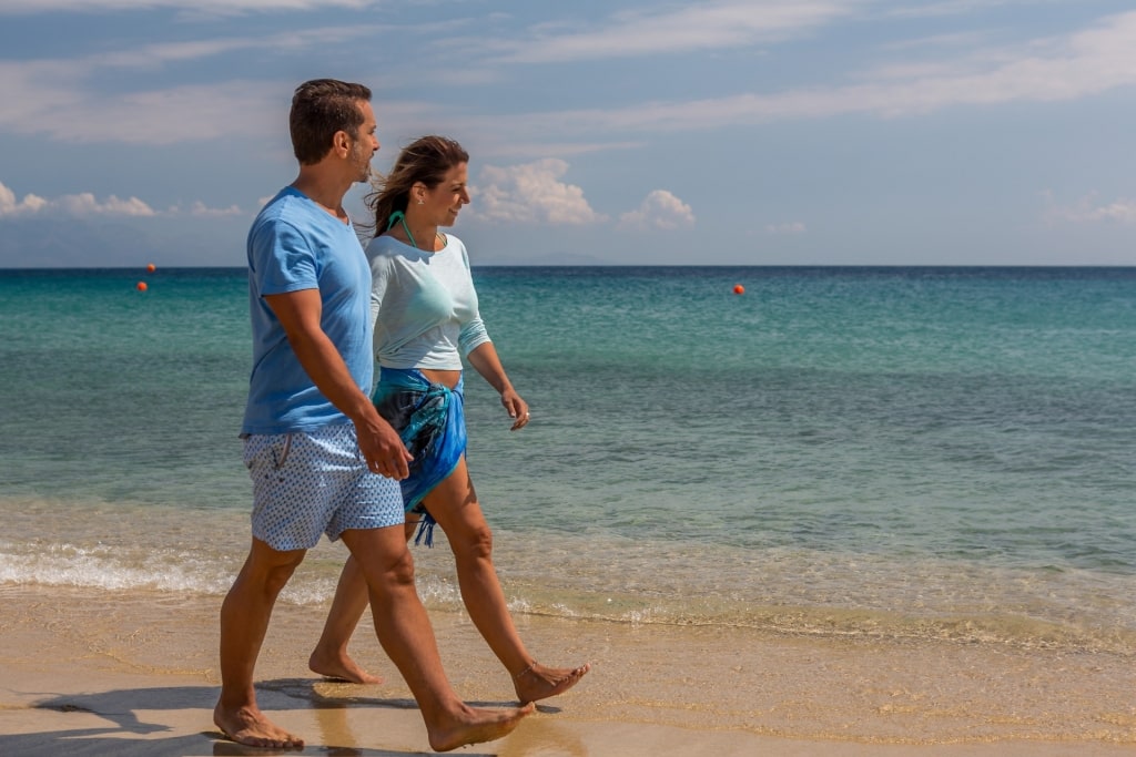 Couple walking at the beach