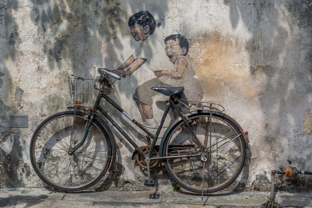 Kids on Bicycle in George Town Malaysia, one of the most famous murals in the world