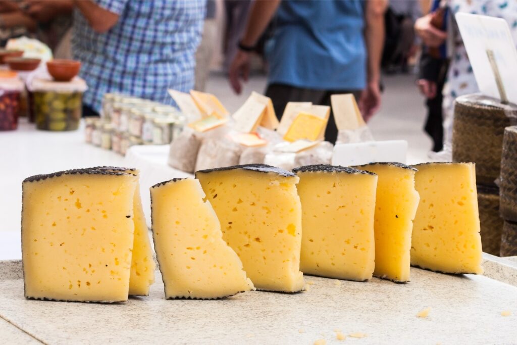 Manchego cheese at a market in Spain