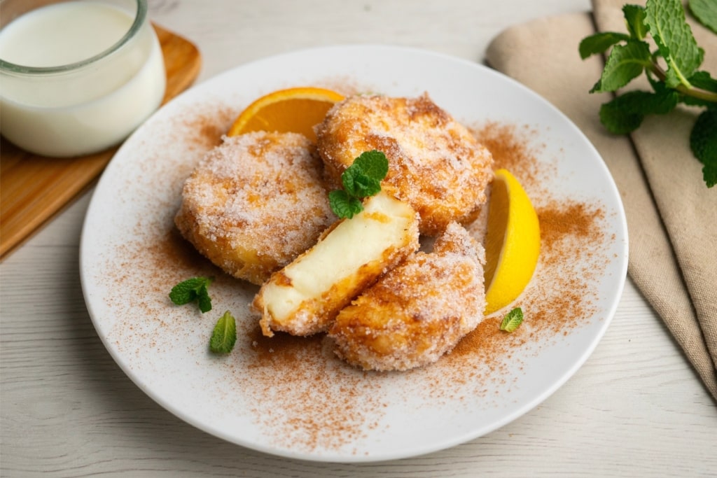 Decadent leche frita on a plate