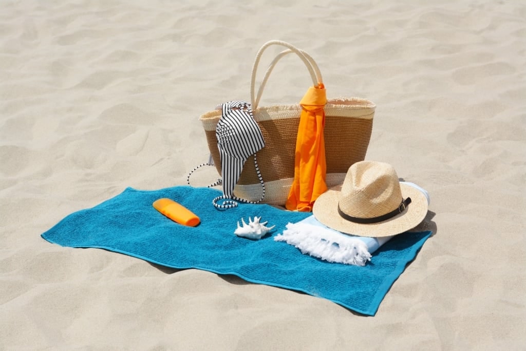 Beach towel with bag and hat