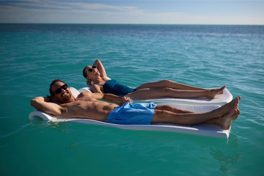 Couple wearing swimwear at the beach