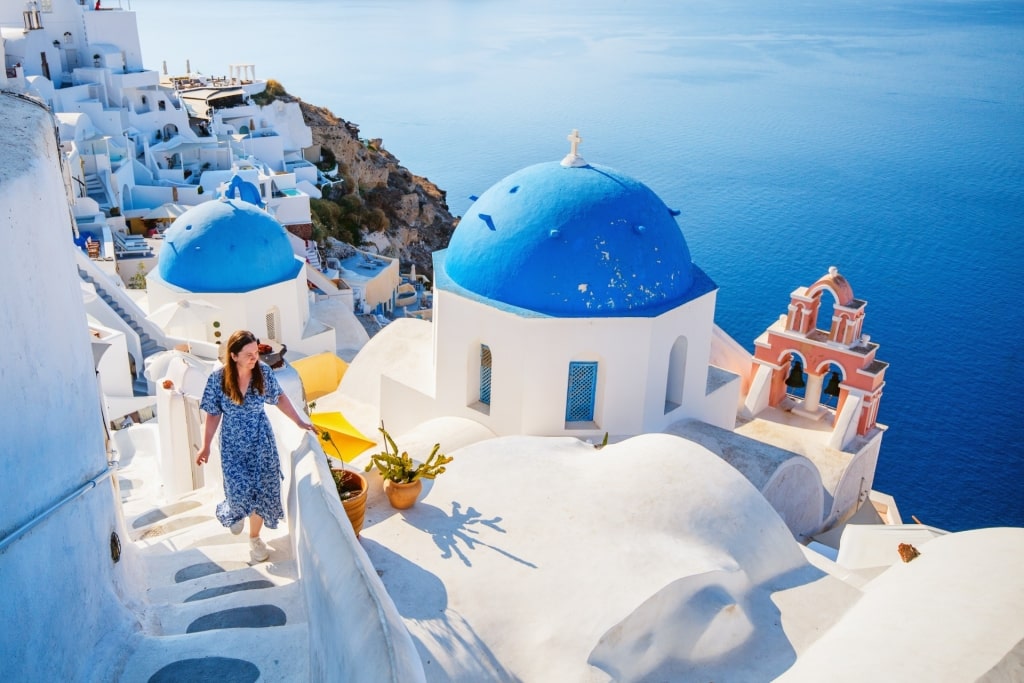Woman exploring the streets of Santorini