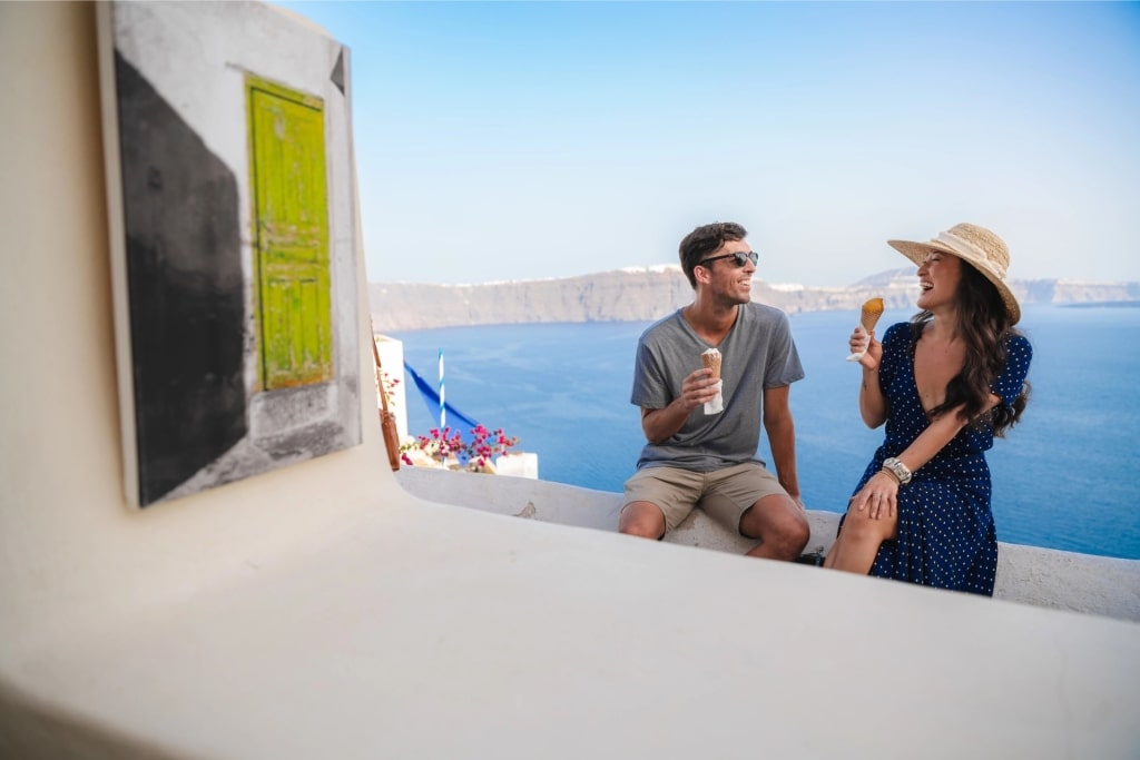 Couple eating ice cream in Santorini