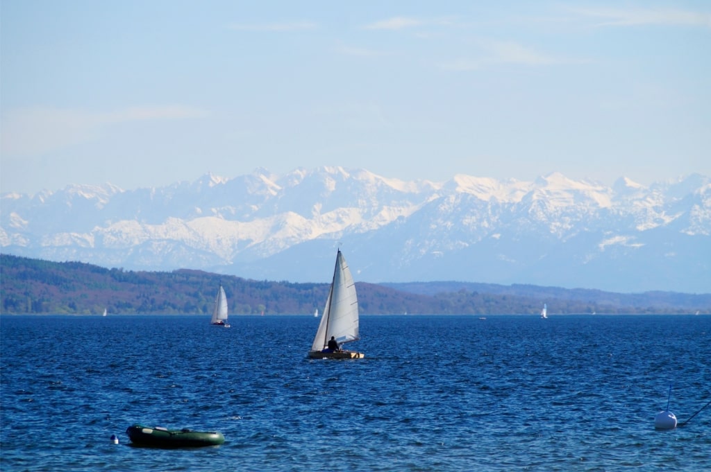 Boats sailing in deep blue Ammersee