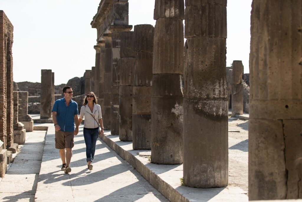 Couple exploring the ruins of Pompeii