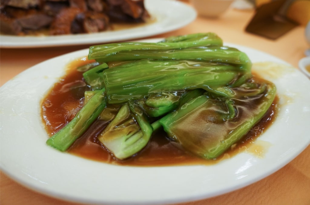 Sauced Chinese broccoli on a plate