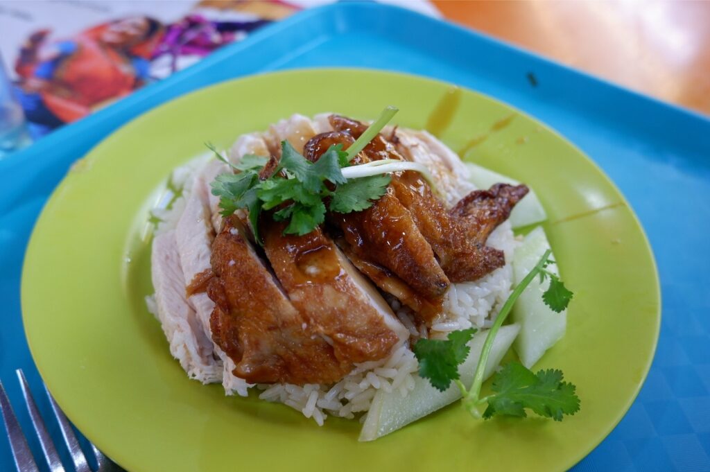 Hainanese chicken rice on a plate