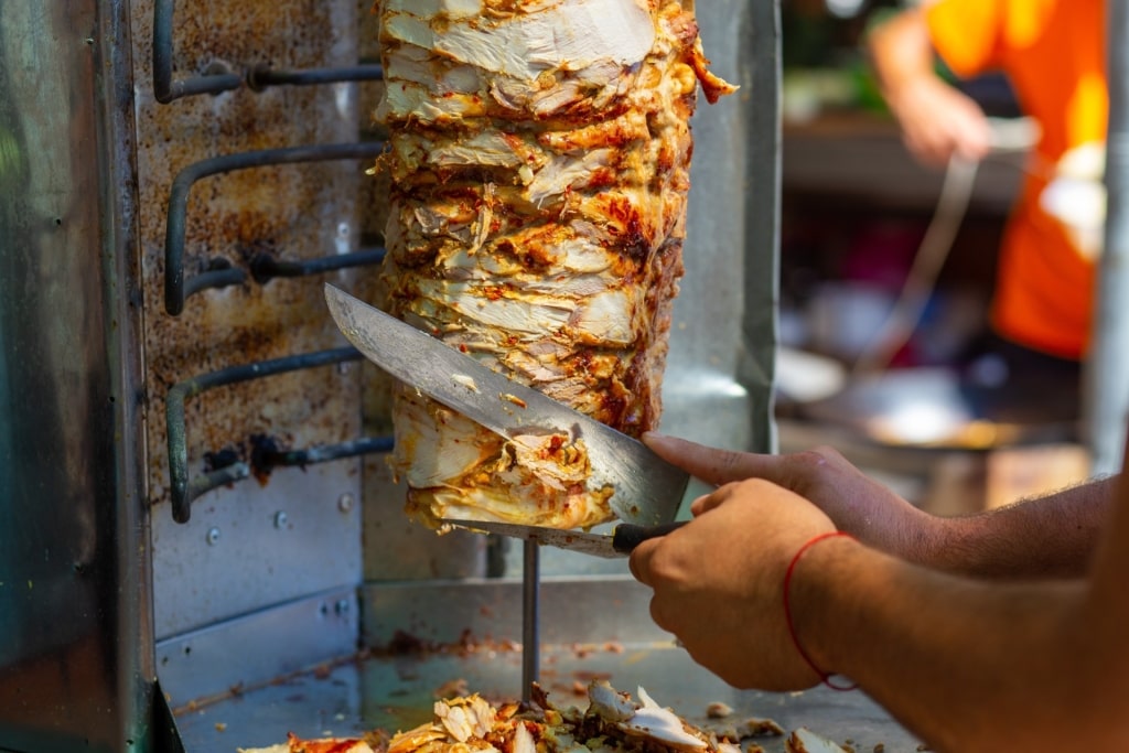 Man slicing döner kebab