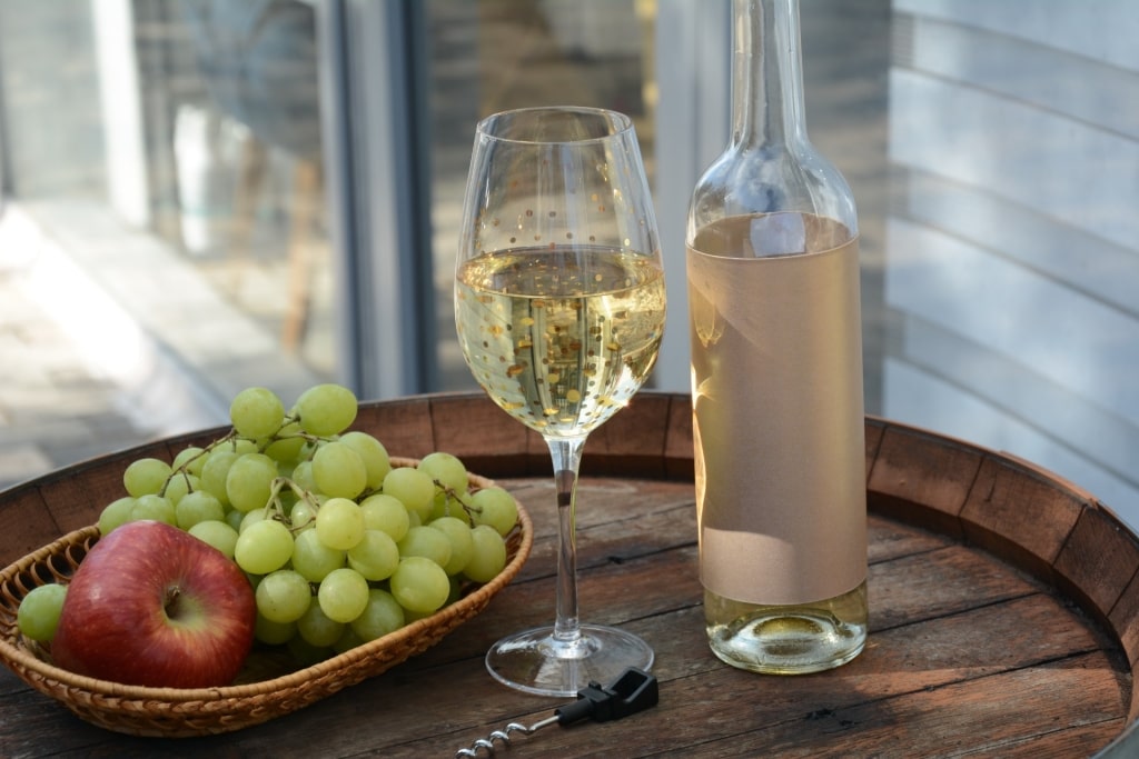 Riesling wine on a barrel table
