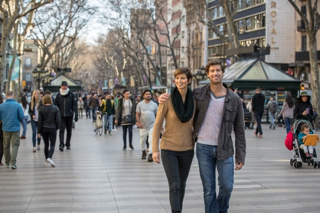 Couple strolling the streets of Barcelona, Spain